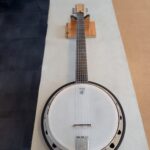 Pose de quart de ton, Banjo guitare